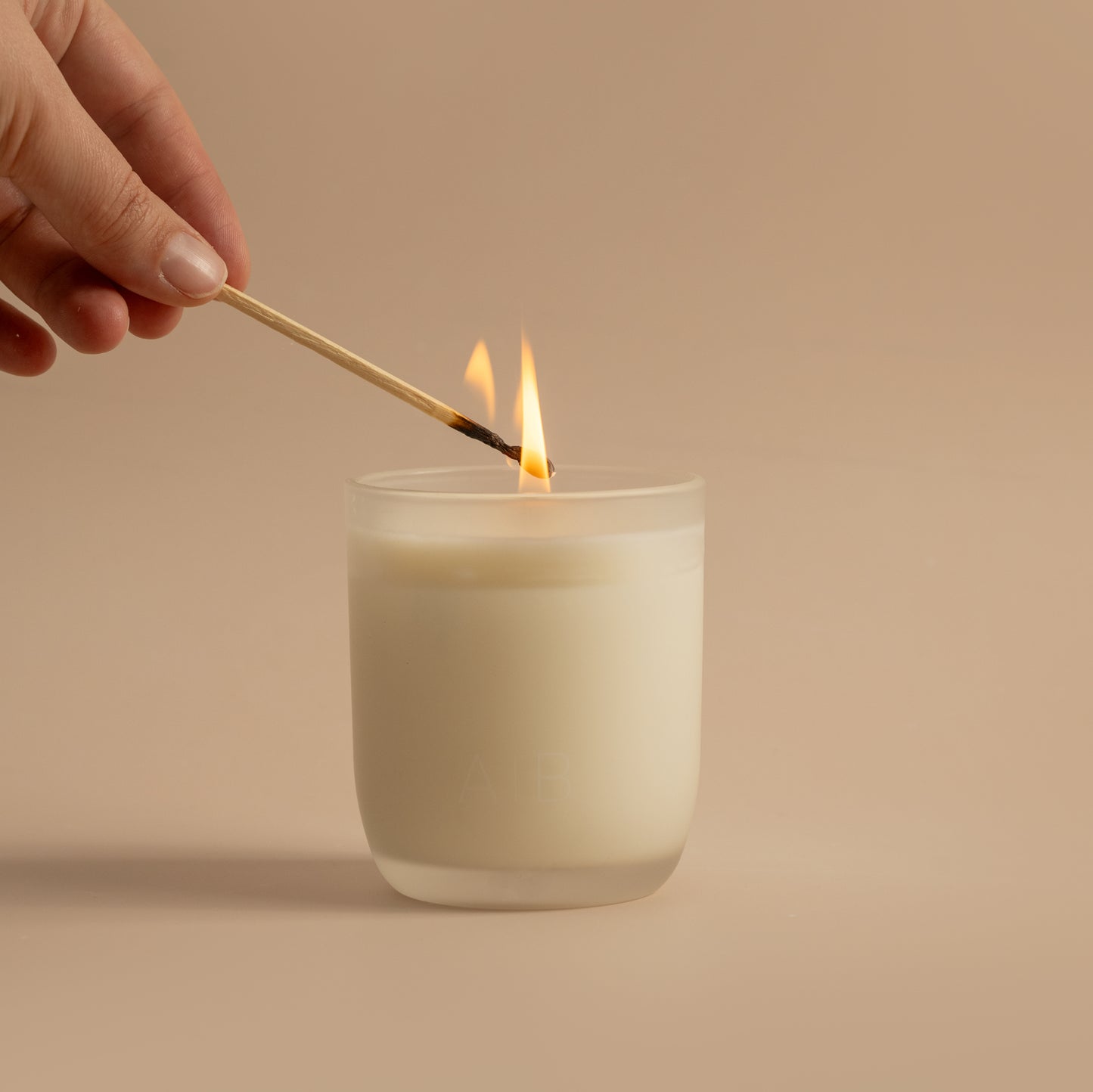 Patchouli, vanilla, ylang ylang, amber, sandalwood and orange candle