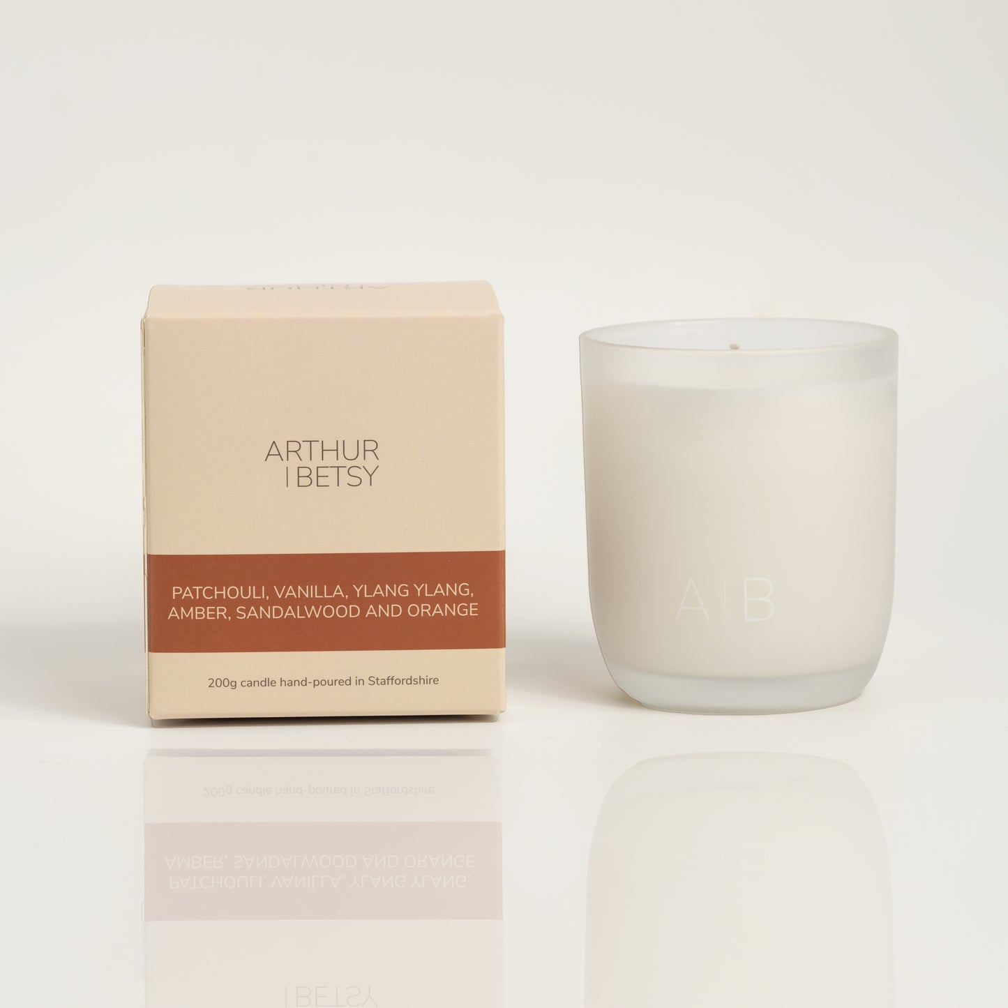 Patchouli, vanilla, ylang ylang, amber, sandalwood and orange candle
