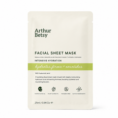 Arthur Betsy Intensive Hydration Facial Sheet Mask in a 25ml single-use stand-up pouch, featuring a cream-colored packaging with green and black text and a light green horizontal accent band. Arthur Betsy moisturising facial sheet mask with sodium hyaluronate, aloe vera, peptides and botanical extracts for hydrated, refreshed-looking skin in 15 minutes.
