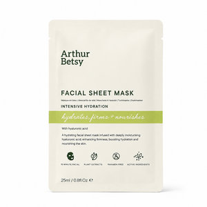 Arthur Betsy Intensive Hydration Facial Sheet Mask in a 25ml single-use stand-up pouch, featuring a cream-colored packaging with green and black text and a light green horizontal accent band. Arthur Betsy moisturising facial sheet mask with sodium hyaluronate, aloe vera, peptides and botanical extracts for hydrated, refreshed-looking skin in 15 minutes.